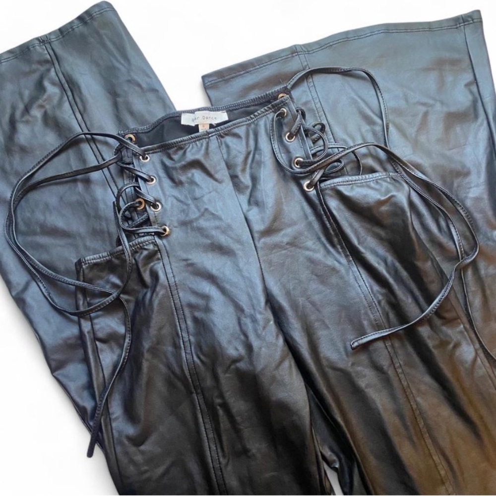 SOLD✨ Black faux leather pants with lace-up sides and flared legs
